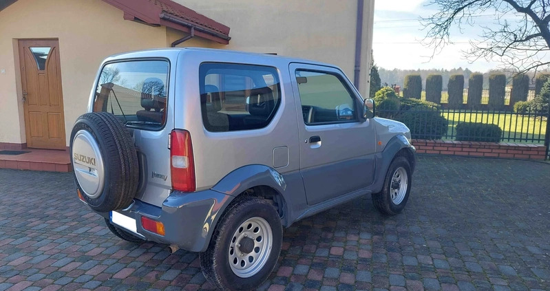 Suzuki Jimny cena 35700 przebieg: 155460, rok produkcji 2011 z Nidzica małe 211